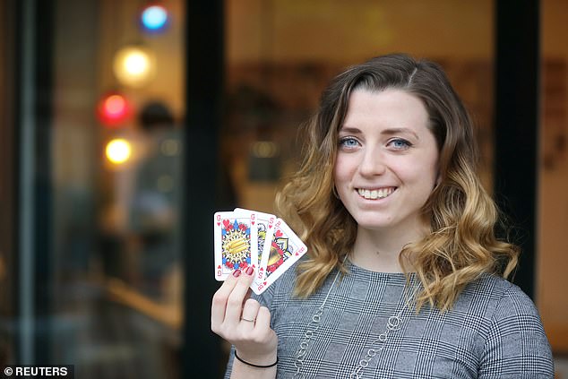 Jennifer shows the gender-neutral playing cards being used.